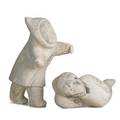Inuit eskimo carved whalebone sculptures reclining sea spirit and standing eskimo figure 20th c larger 18