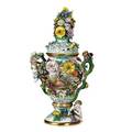 Meissen porcelain handpainted porcelain covered urn with applied putti and large floral finial 19th c crossed swords mark 24 x 12 x 9 12
