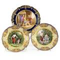 Dresden  sevres porcelain plates three with handpainted genre scenes and elaborate gilded borders early 20th c largest 9 14 dia