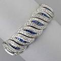 18k white gold diamond and sapphire bracelet flexible ribbon of leafshaped links bead set brilliant cut diamonds 609 cts tw and channels of french cut sapphires 1344 cts tw 395 dwt 615