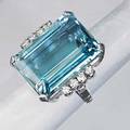 Brazilian aquamarine and diamond ring ca 1955 emerald cut aquamarine 236 x 182 x 124 mm 33 cts by formula and 8 brilliant cut diamonds approx 72 ct tw in 18k gold 131 dwt 203 gs