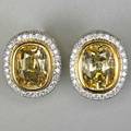 Fashionable yellow sapphire and diamond earrings bright faceted cushion cut sapphires each approx 6 cts in 18k yg within micro pave diamond platinum halos clip backs for unpierced ears 113 dw