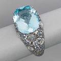 18k gold aquamarine diamond and sapphire ring oval faceted aquamarine approx 65 cts prong set on rose cut diamond and pale blue sapphire bombe patinated wg ca 2000 64 dwt 99 gs size