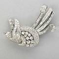 Platinum diamond bird clip brooch ca 1950 hand built in high relief circular and baguette cut diamonds approx 2 cts tw 122 dwt 19 gs 1 34