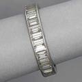 Platinum diamond eternity band twentynine baguettecut diamonds approx 350 cts tw channel set 23 dwt 37 gs size 7 34
