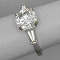 Diamond solitaire engagement ring circular brilliant cut diamond approx 150 cts tapered baguette cut shoulders in 14k wg 24 dwt 38 gs size 6