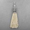 Art deco diamond onyx pearl tassel ca 1930 platinum oblong cap with rows of rose and oec diamonds and channels of calibrated onyx suspends 34 2 12 strands of oriental seed pearls hinged bail a