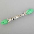 Platinum diamond carved jade onyx brooch barbell form openwork with oec diamonds and french cut onyx channels chinese foliate carved jade terminals ca 1925 unmarked 57 dwt 89 gs 2 34