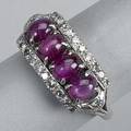 Star ruby platinum diamond ring ca 1950 four ruby cabochons approx 250 cts tw bordered by rows of single cut diamonds 44 dwt 68 gs size 7