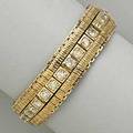 14k gold diamond tennis bracelet and jacket thirtyone diamonds approx 775 cts tw and detachable flexible textured yellow gold jacket 253 dwt 394 gs 6 12 x 58