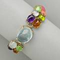 14k gold gemstone cobblestone bracelet cabochon and polished aquamarine amethyst peridot tourmaline and citrine prongset on hinged panels in 14k yg ca 1950 365 dwt 569 gs 7 x 34
