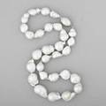 Strand of baroque silver south sea pearls 18 necklace of 29 highly lustrous irregular whitesilver saltwater pearls 195109 mm on an oblate 14k wg diamond clasp
