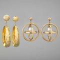 Two pairs large 14k gold earrings ca 1970 three concentric orbital rings and a pearl drop 1 34 textured gold rings drop from texture boulle surmount 2 38 for pierced ears 221 dwt 343