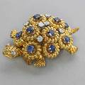 Tiffany  co gold diamond sapphire turtle brooch textured 18k yg clip brooch with eight diamonds approx 50 ct tw 20th c 157 dwt 245 gs 1 14