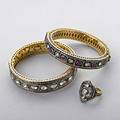 Indian foilbacked diamond jewelry two hinged bangle bracelets and a silvertopped 18k gold and 10k yg ring bracelet and ring of alternating rubies and diamonds in 18k gold concentric diamond brac