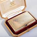 Samuel arndt gold cigarette case st petersburg 1893 rectangular cushionform with concentric radial flute decoration inlaid bicolor cyrl monograms r b discreet match chamber with internal str