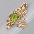 Art nouveau chased and jeweled gold ring ca 1900 scrolling tendrils with oval peridot and four oec diamond accents 14k yg 6 dwt 93 gs size 6