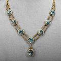 14k gold zircon and seed pearl necklace ca 1915 rows of wrapped wire links suspend circular and oval faceted blue zircons framed by strung seed pearls 195 dwt 305 gs 16 drops 1 12