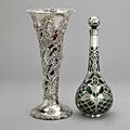 Ornate american silver and glass vessels ca 1900 rocquille and floral decorated pierced trumpet vase by redlich  co with cranberry glass liner 14 silver overlaid green glass decanter and stopp