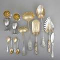 American ornate silver 18601880 fourteen pieces most parcelgilt retailed by bailey  co philadelphia gorham parcelgilt and bright cut neoclassical oyster server and ice cream shovel gorham