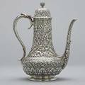 Tiffany  co silver repousse coffee pot ca 1877 after dinner coffee pot with deeply raised and chased foliage and flowers throughout scroll and acanthus bands ivory insulator 247 ot 9 12