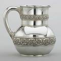 Tiffany  co sterling water pitcher 18921902 bulbous with chased foliate scroll repousse bands 3077 script monogram am 2296 ot 7 18