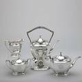 Currier  roby silver coffee service 19001943 four pieces with urn finials and ivory insulators kettle on stand with burner 13 pot 7 covered sugar bowl 5 cream pitcher 4 34 ornate int