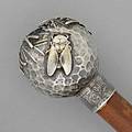 Tiffany  co japanesque silver swagger stick japonesque style spot hammered sphere with applied chased gilt insect and pine boughs inscribed on collar orville d lovell from ahl dec 25 1883