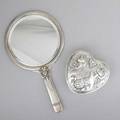 Tiffany  co silver accessories 18731891 hand mirror with mask handle in the greek revival style heartshaped jewelry box with pearled repousse in the indian style fitted blue velvet interior l