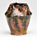 George ohr vessel with crimped rim spongedon pink indigo green gunmetal and yellow glaze biloxi ms 1890s stamped ge ohr biloxi miss 5 x 4 published ellison george ohr art potter