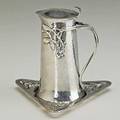 Chicago silver hammered silver maple syrup jug with pollywog and twig handle on matching tray chicago il ca 1910 monogrammed s for frank d stout otherwise unmarked jug 5 12 x 4 11 ot