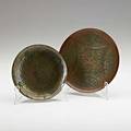 Walter jennings roycroft two patinated hammeredcopper plates venetian ware east aurora ny 19061915 orb and cross marks 6 dia and 7 dia