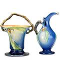 Roseville blue pinecone ewer and basketshaped vase obscured roseville mark to ewer basket 10 12 x 8 12 x 7 18 dia