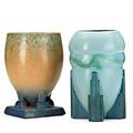 Roseville two futura vases ribbed and buttressed vase and fourfooted vessel unmarked tallest 7 34