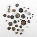 Asian button grouping approx eighty items include mixed metal satsuma ivory etc 19th20th c largest 1 14