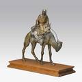 Vienna coldpainted bronze depicting a camel and rider on wood base 19th20th c marked 12 12 x 13 x 6