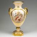 Austrian porcelain urn cherub reserves with gilded handles and decoration early 20th c artist signed illegibly beehive stamp 21 38