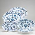 Meissen blue onion five serving pieces 20th c four platters and 1 onehandled vegetable bowl marked meissen in oval largest 17 12 x 11 34