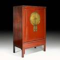 Asian red lacquer cabinet paneled doors with brass center medallion and chinoiserie decorated interior panels 20th c 70 12 x 46 x 26