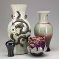 Asian pottery four items 19th20th c large vase with applied dragons threehandled vase and two other vases one marked tallest 16 12