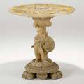 Alabaster center hall table figural base on paw feet and inlaid foliate design top 20th c 31 12 x 30 12 dia