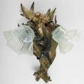 French figural bronze wall sconce depicting a baby wrapped in foliage swirled opalescent shades early 20th c foundry mark 17 x 9 12 x 9