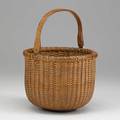 Nantucket basket swing handled with turned wooden base early 20th c 10 12 x 7 34 dia