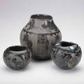Sioux blackware pottery three pots by norman red star with sgraffito decoration and applied coral in turquoise 20th c all signed tallest 9