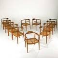 Style of hans wegner set of twelve dining chairs denmark 1960s sculpted teak and woven cane unmarked each 30 x 24 12 x 21