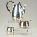 A dragsted sterling threepiece coffee service sleek forms with loop handles the 7 12 coffee pot with ebony thumbpiece on hinged lid denmark c1960 328 ot