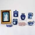Wedgwood mettlach eight pieces 20th c four jasperware lidded boxes two creamers and vase together with mettlach cameo plaque all marked plaque overall 8 x 6