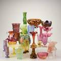 Art glass grouping approximately thirty pieces late 19th20th c cranberry glass austrian lustre vaseline glass pair of bristol vases etc unmarked tallest 11 12