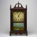 Seth thomas mantel clock pillared and scroll style reverse painted panel time and strike movement mahogany case early 20th c 24