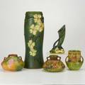 Roseville five pieces tall dogwood vase and bud vase wisteria vase and two blackberry vessels some labels tallest 15 34